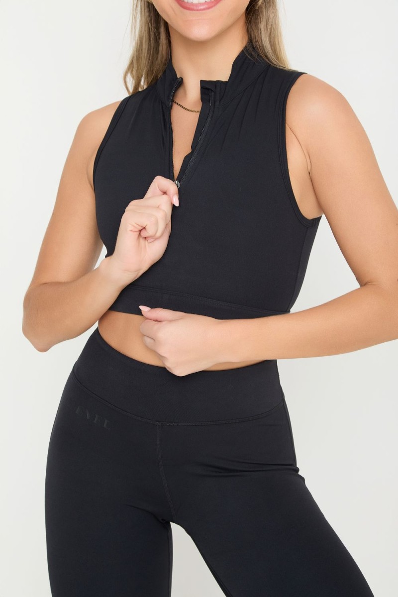 level high neck quarter zip crop top